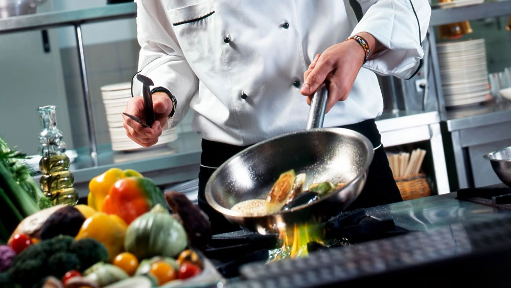 chef preparing meal for an inclusive event