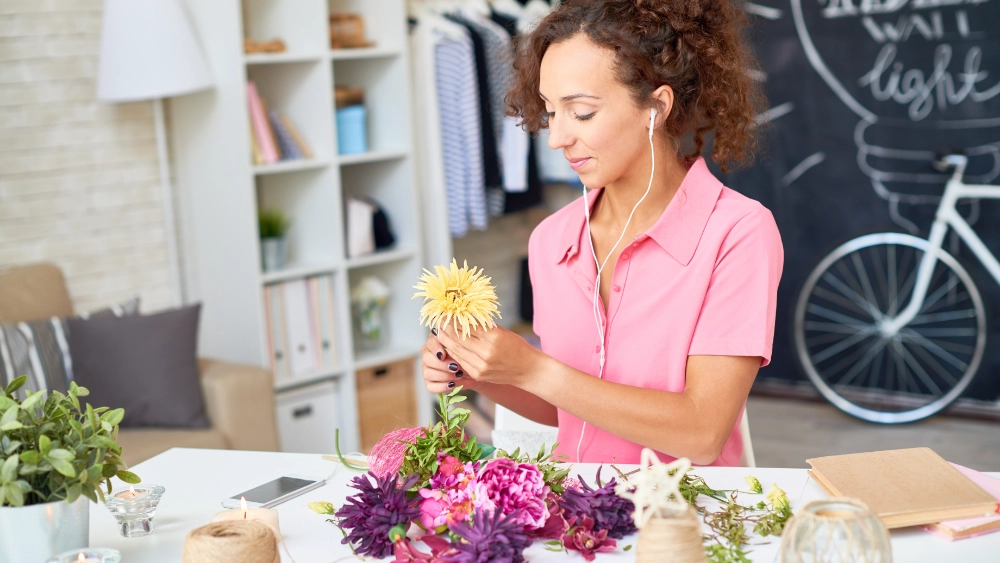 floral designer arranging flowers